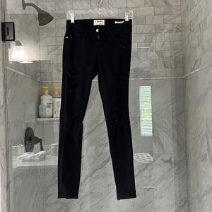 Frame denim black ripped skinny jeans